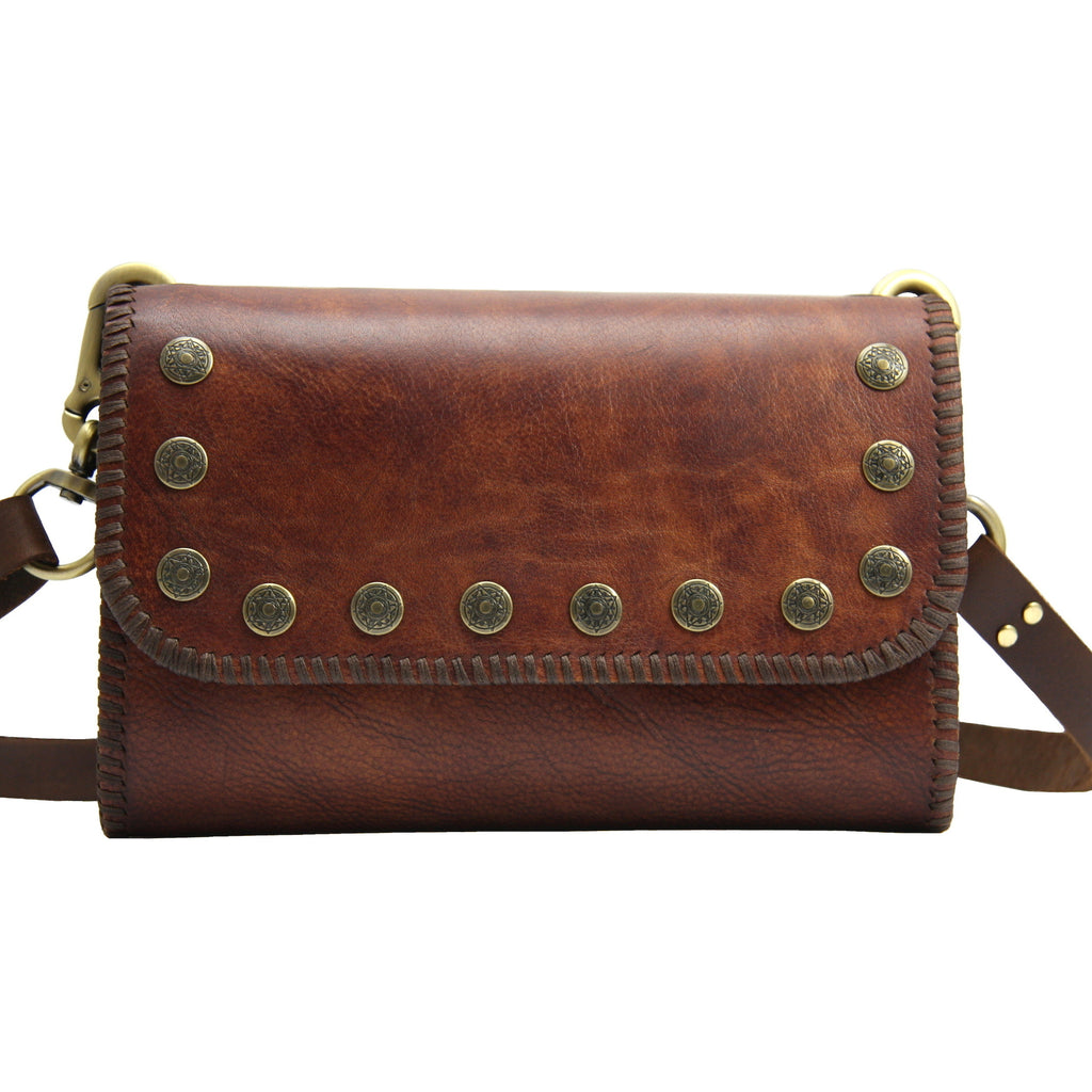 handmade brown leather cross body bag with antiqued brass studs front view
