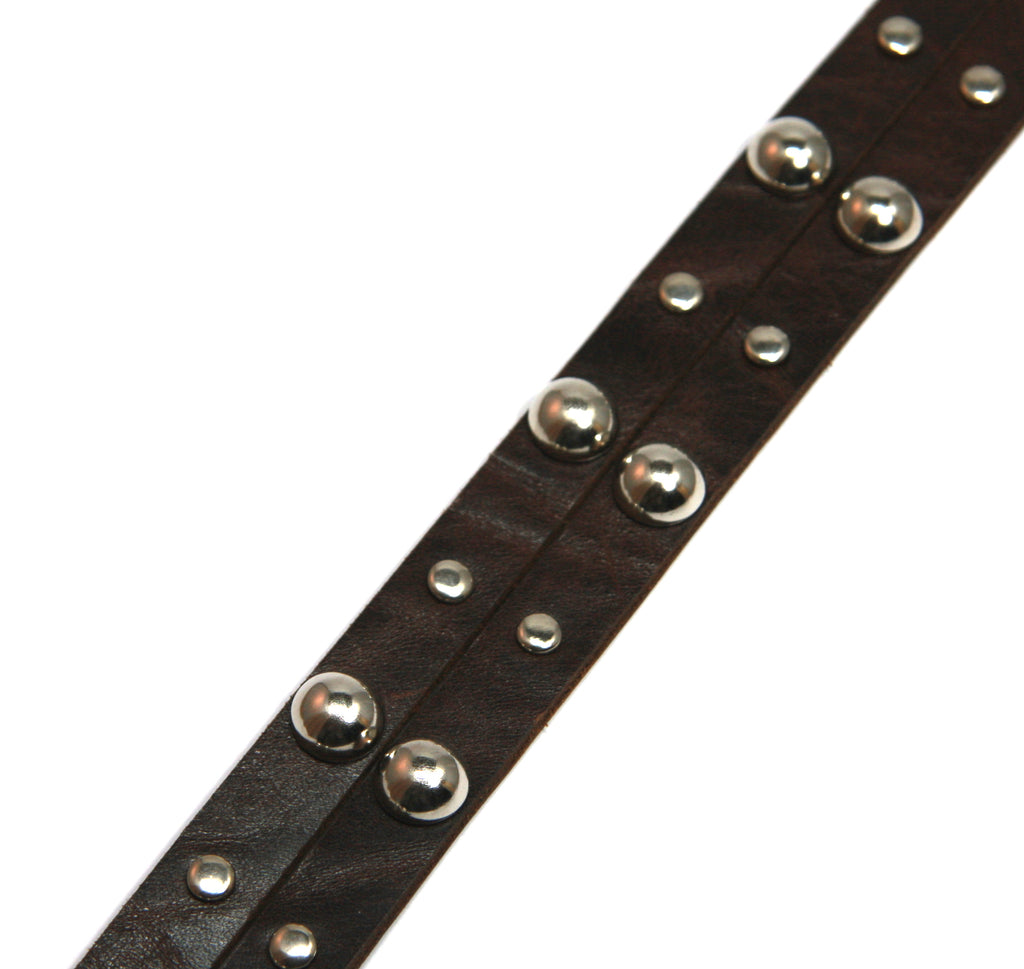 close up of dark brown hat band with large silver studs