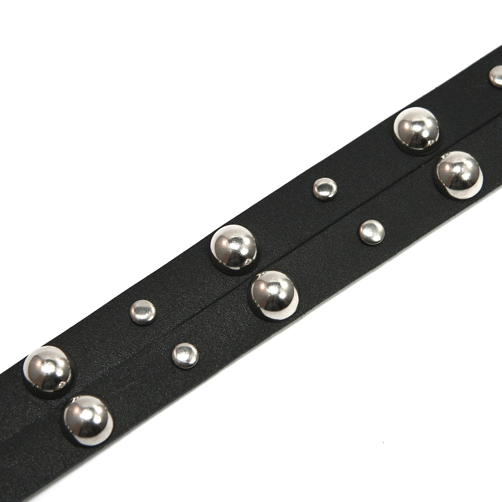 black leather hatband with large silver studs close up