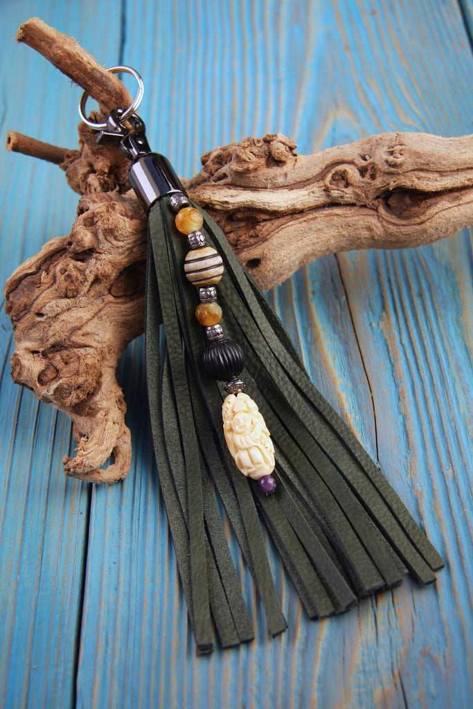 carved bone netsuke bead on olive green suede leather tassel key chain bag charm 