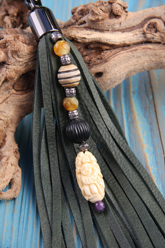 olive green tassel with carved bone netsuke bag charm key chain beaded with carnelian and fossilized coal