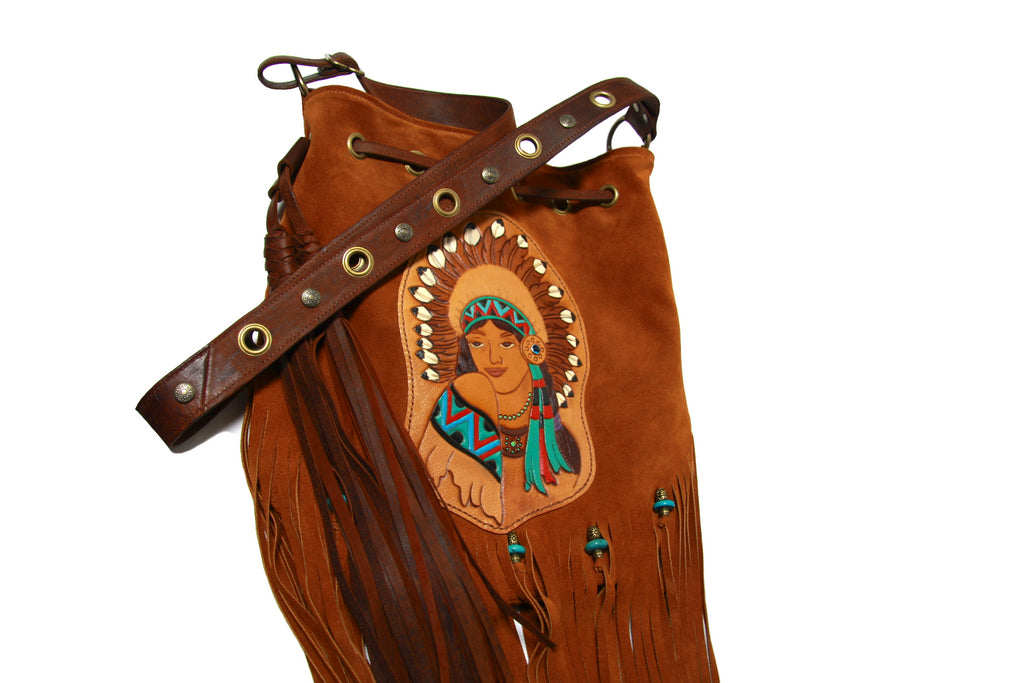 tan suede drawstring handbag with Indian chief applique on front