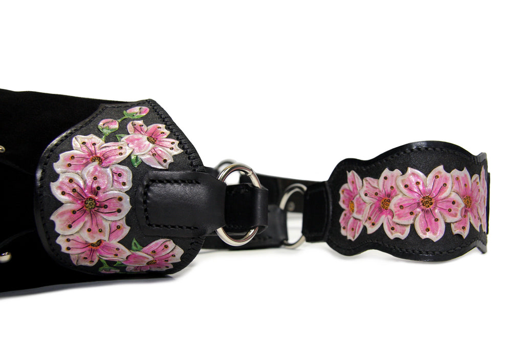 hand tooled cherry blossom accent on shoulder strap and side of black suede tote