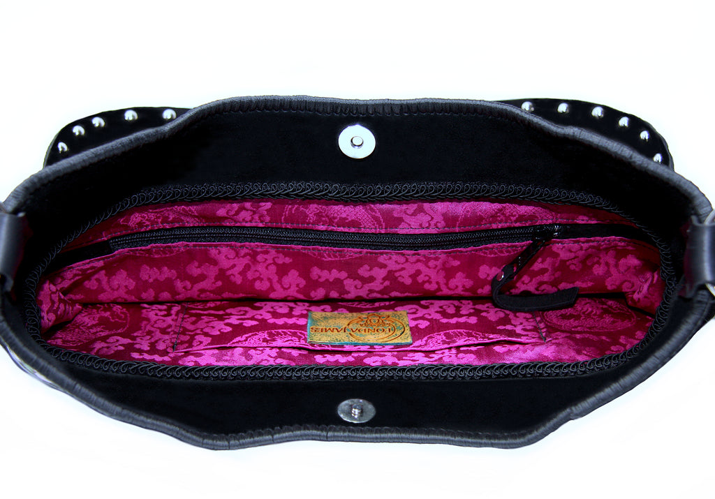 hot pink Chinese silk lining inside black suede hand tooled tote